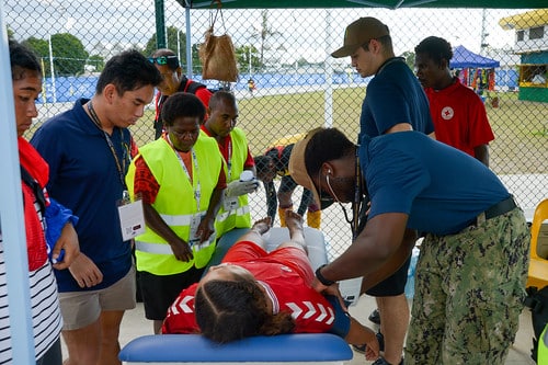 medical team helping out athlete