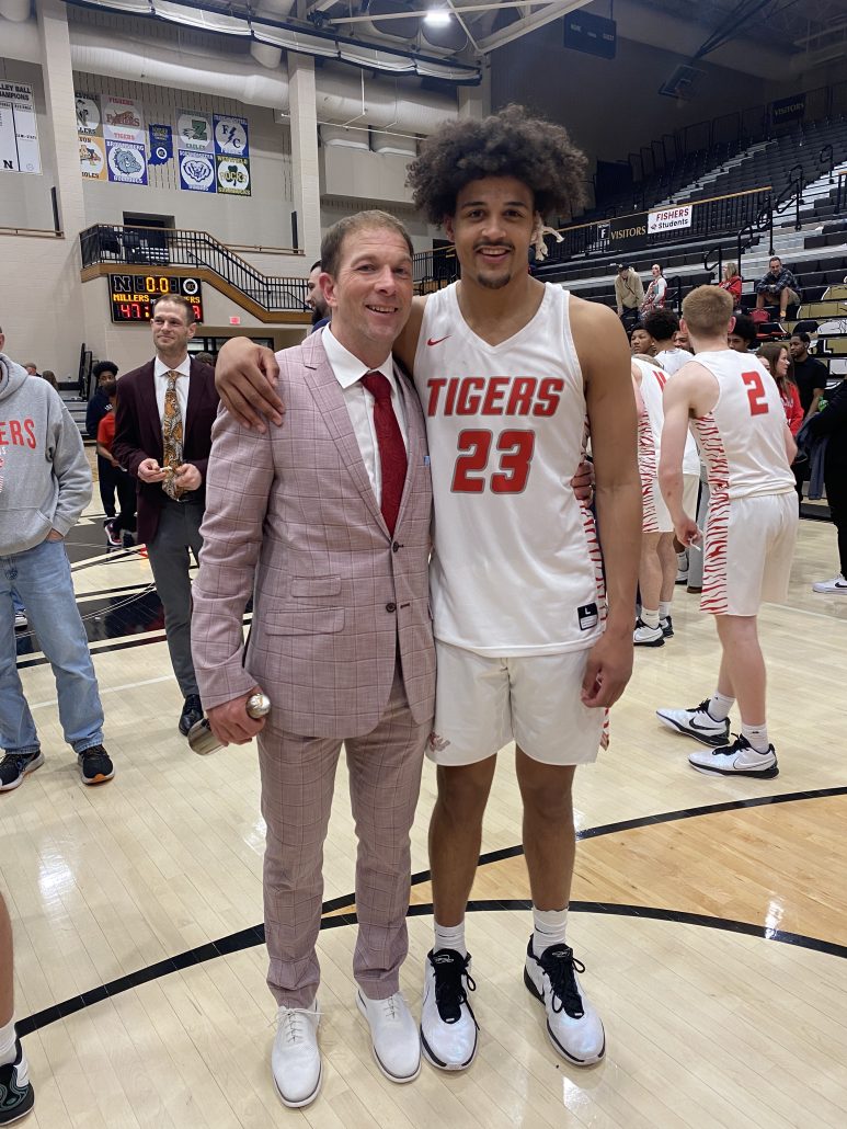 Dr. Bell with Fishers basketball player